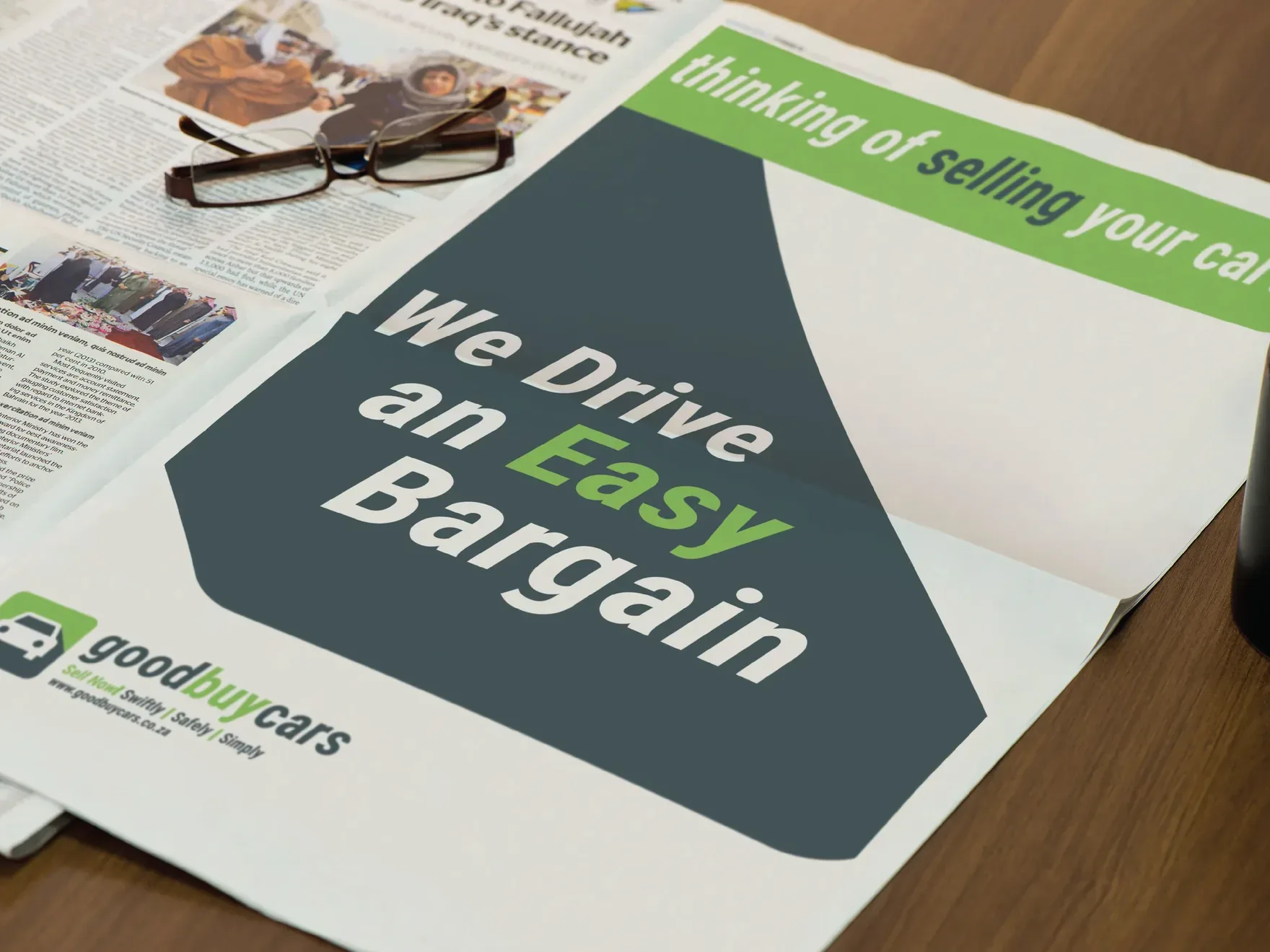 Full-page newspaper advert for Good Buy Cars reading We Drive an Easy Bargain.