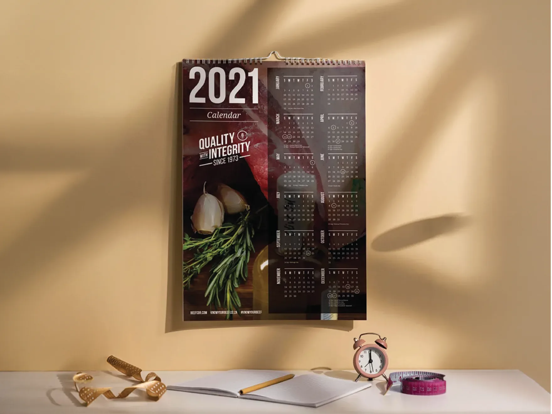 Beefcor 2021 wall calendar with steak photography and the quality with integrity badge.